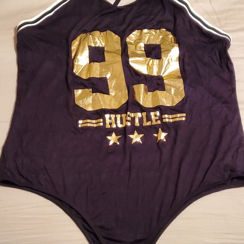 Black and gold body suit
